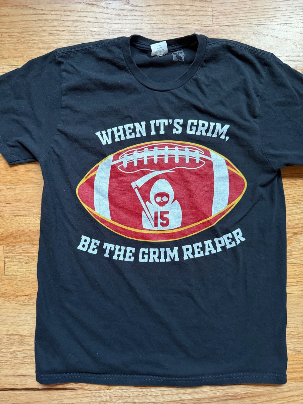 “When it's grim, be the Grim Reaper," Black T-shirt
